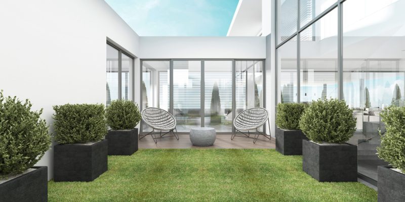 Backyard houses in the style of Contemporary with two modern chairs. 3D rendering